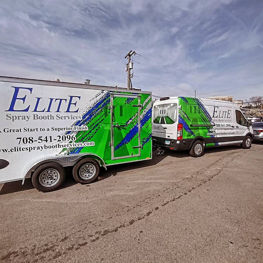 Elite trailer and van on site